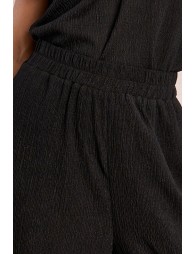 Straight, flowing trousers in semi-sheer