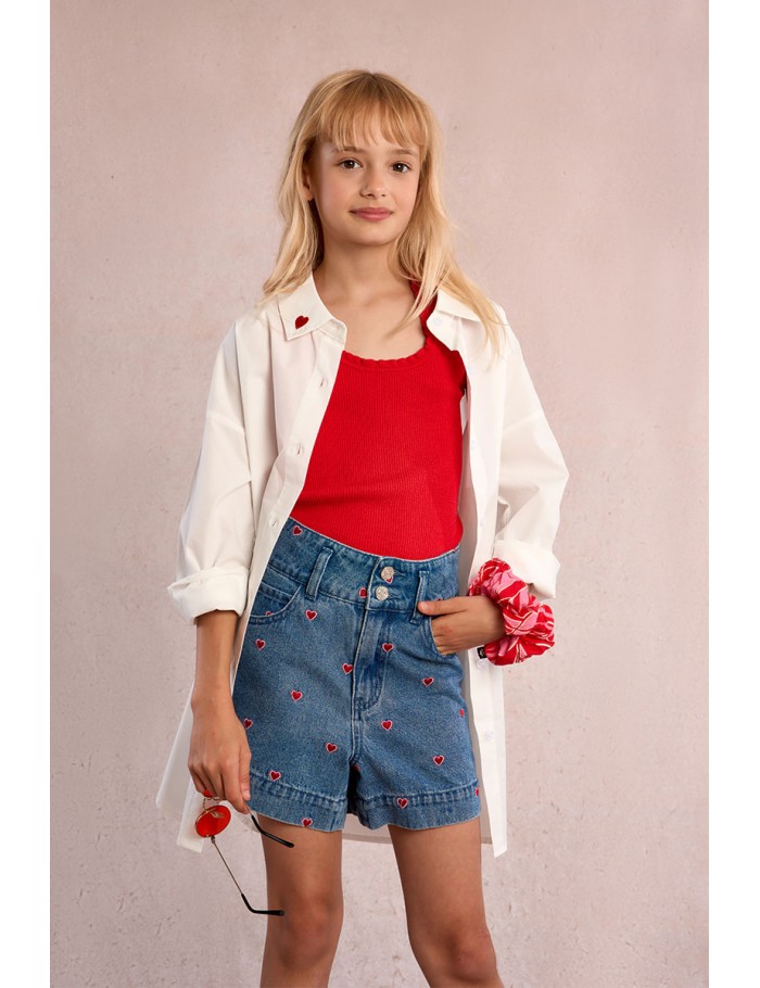 Top de niña sin manga, detalle volentes.