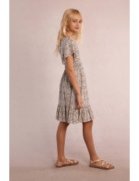 Vestido de niña de manga corta, con estampado y volante.
