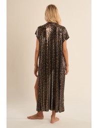 Chaqueta de mujer larga, en tejido brillante, con flecos y estampado.