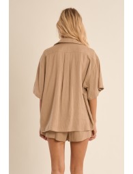 Camisa de mujer de manga corta, asimétrica.