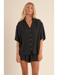 Camisa de mujer de manga corta, asimétrica.