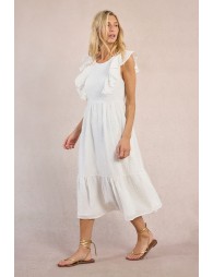 Vestido largo, de manga corta, con volantes y lunares.