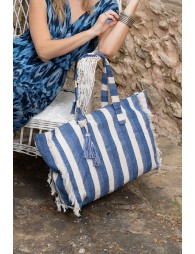 Bolso de mujer de tela, con estampado y flecos.