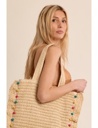 Bolso de mujer de mano, trenzado, de rafia.